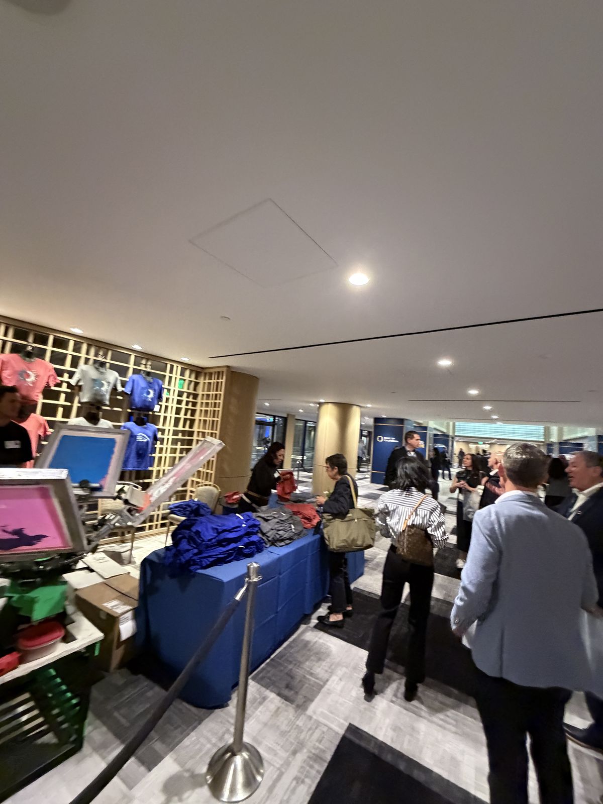Merch Troop live printing — presses rolling at the event